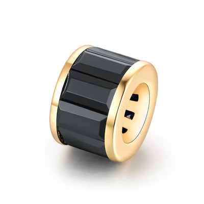 Black Spinel Rondelle bead charm for necklaces, bracelets. Fine Jewlery. Set in 14K yellow gold. Available in three sizes. Made in Palm Beach Florida by design team Pelimingo.
