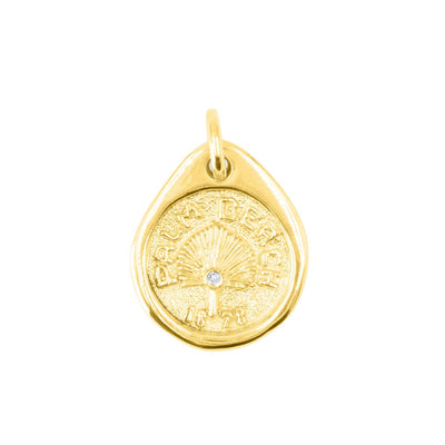 Our Palm Beach Pendant / Charm is made in 14K solid yellow gold with a satin and polished finish. Handcrafted in Palm Beach Florida by jewelry design team and local fine jewelry Pelimingo. Palm Beach town name, date town was settled and native palm tree Sable Palm on charm.