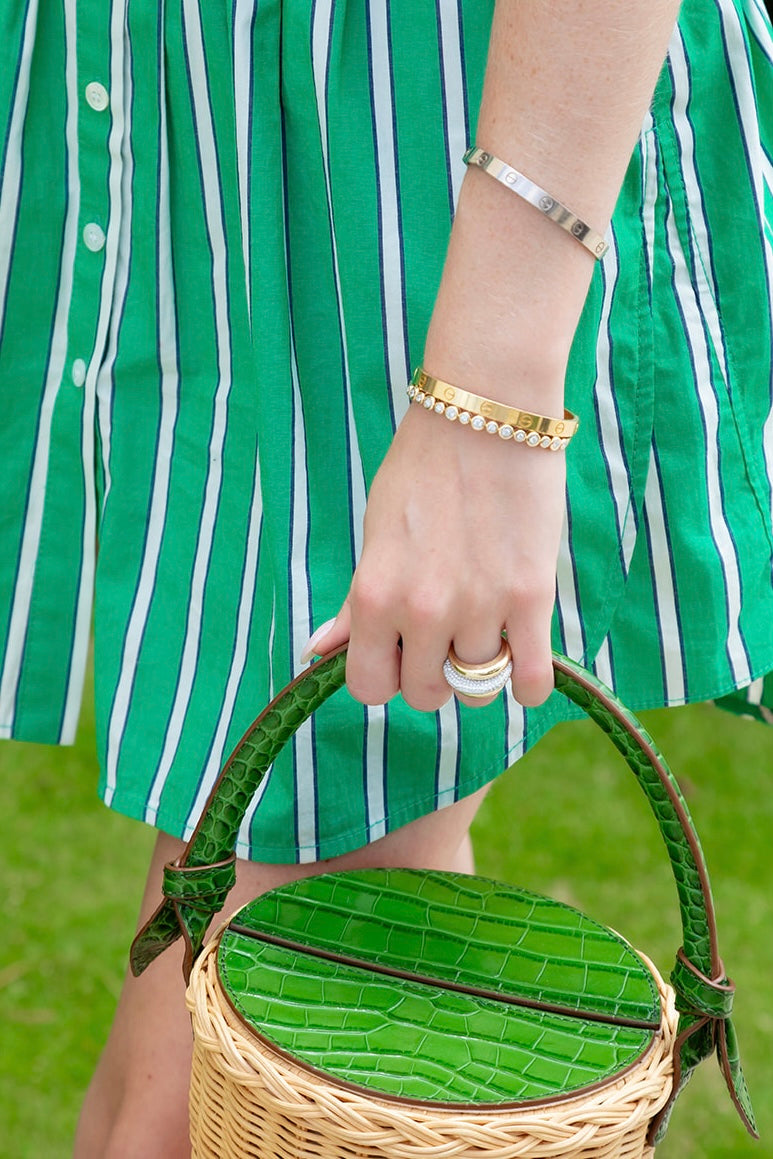 14K yellow gold high polished diamond bangle bezel set.  Great to wear alone or add to your wrist stack.  Sold in Palm Beach by local jewelry design team Pelimingo Palm Beach