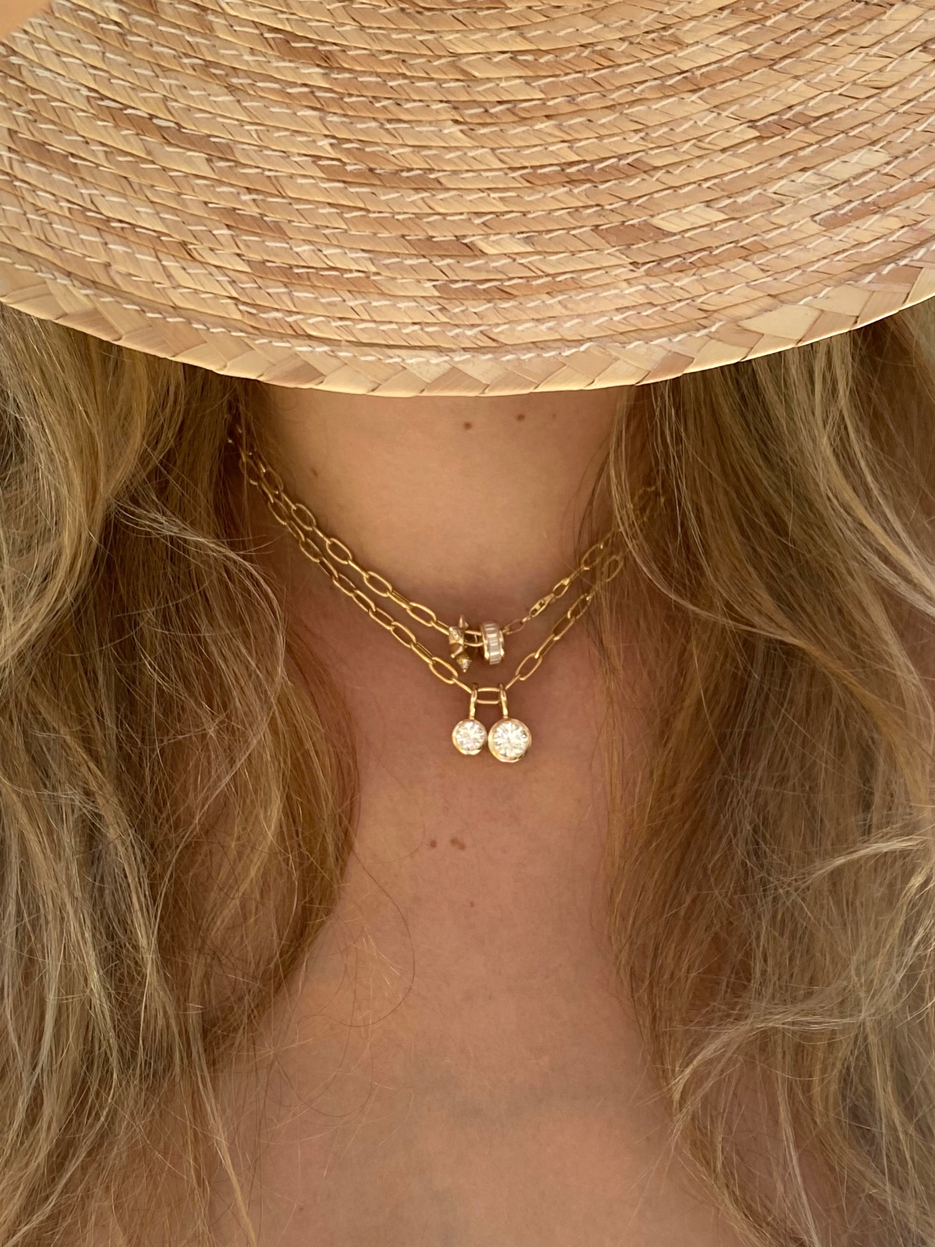 14k yellow gold solitaire diamond pendant bezel set.  Worn on a necklace, collar or chain.  Designed by jewelry team Pelimingo Palm Beach.  Fine Jewlery, Palm Beach Style, lab grown stone
