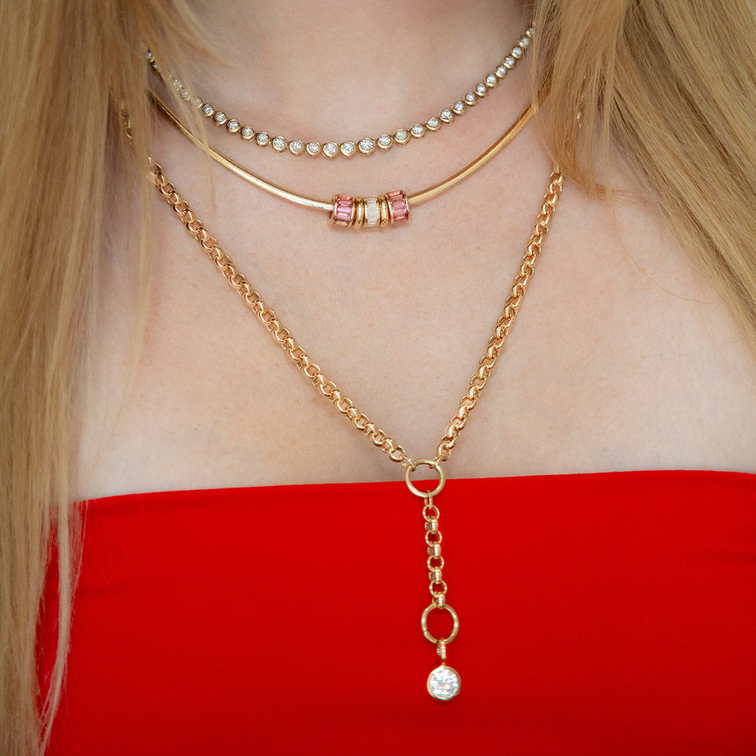 14k yellow gold solitaire diamond pendant bezel set.  Worn on a necklace, collar or chain.  Designed by jewelry team Pelimingo Palm Beach.  Fine Jewlery, Palm Beach Style, lab grown stone