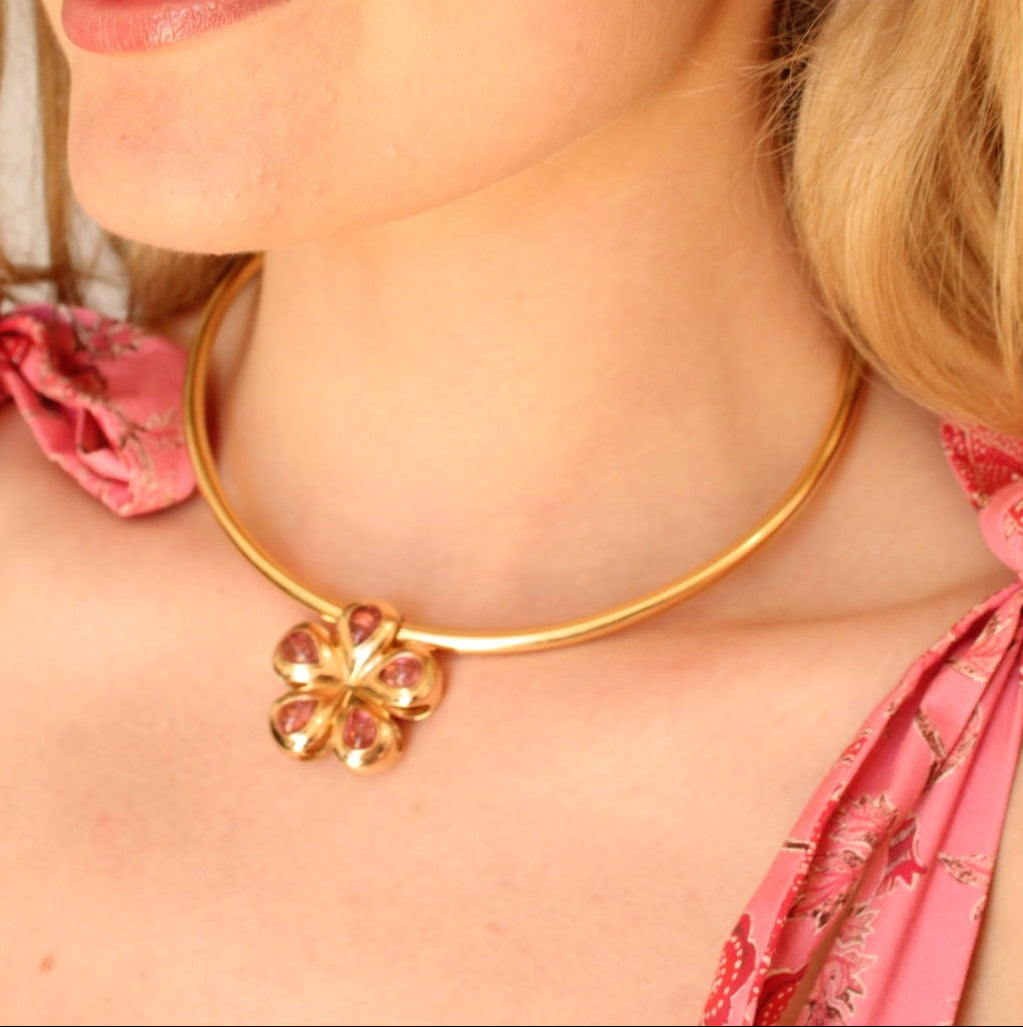 Flora Blossom flower in 14K Yellow Gold with Pink Cabochon Tourmaline Stones.  Made in Palm Beach by local design team and jewlery store Pelimingo Palm Beach