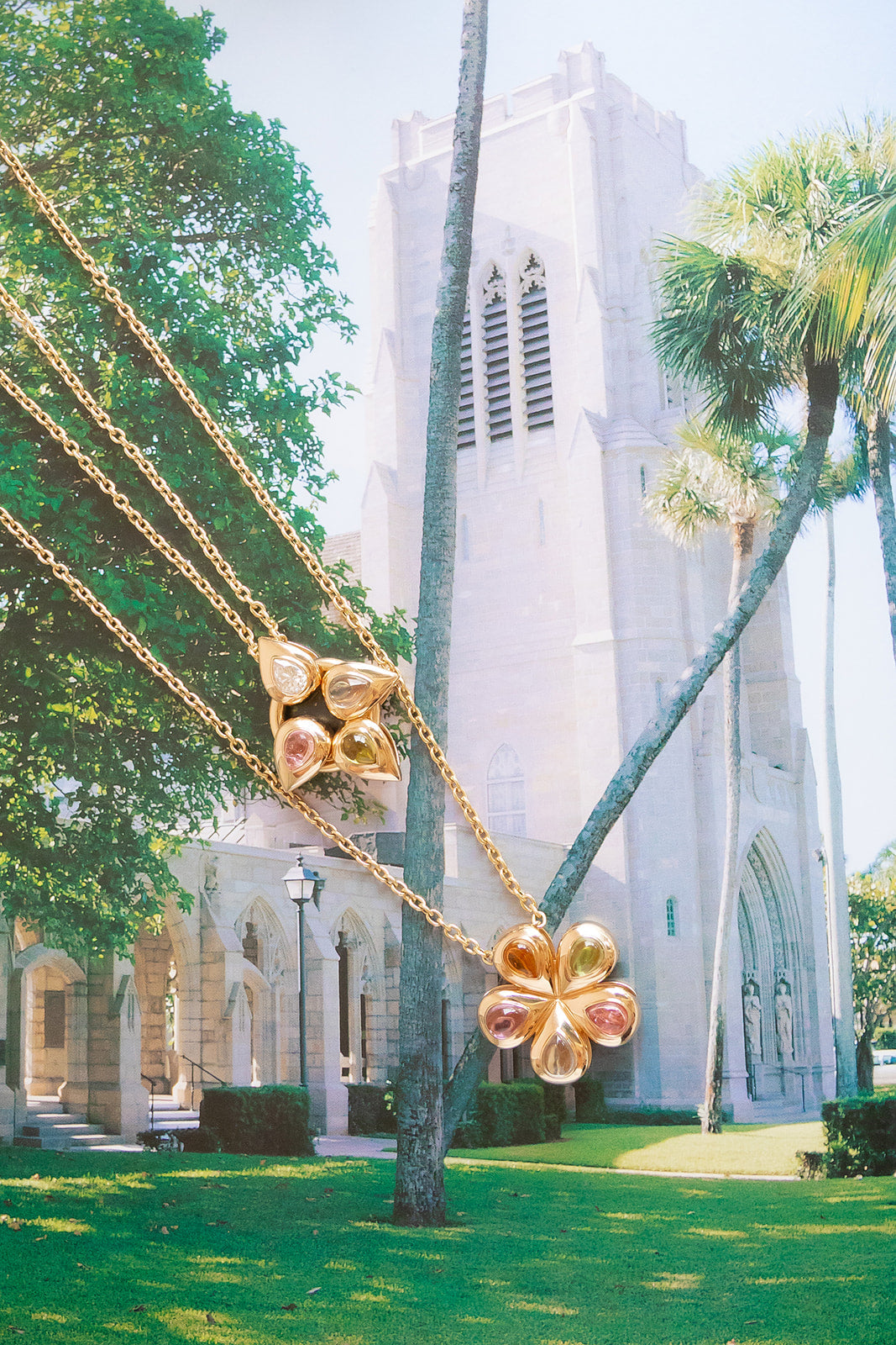 Our Flower Multi Cabochon glider to put on a necklace or collar.  14K yellow gold with peridot, citrine, pink tourmaline, blue topaz, all made locally in Palm Beach Florida by jewelry design team Pelimingo Palm Beach