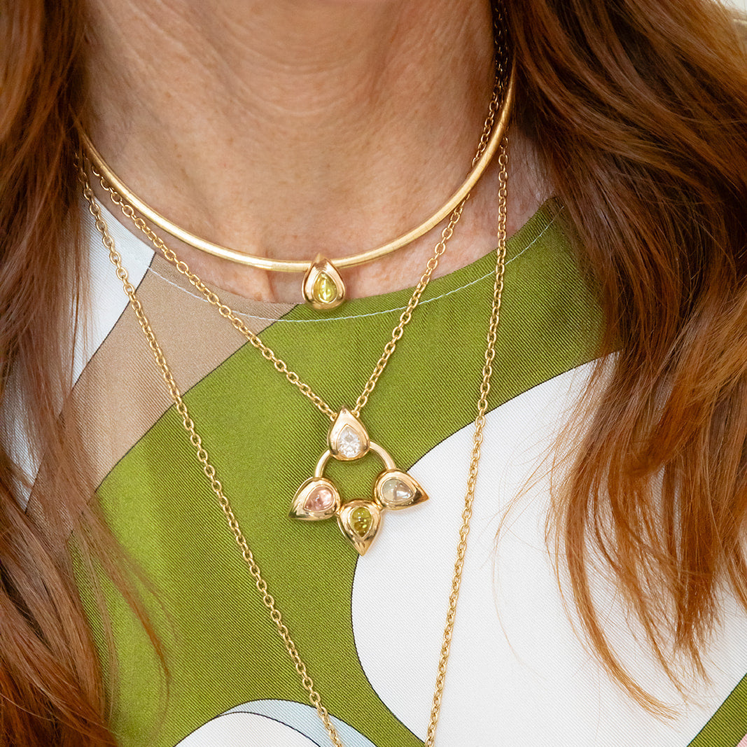 From our Flora Blossom Collection, meet our Flower Petal in cabochons colors all set in 14K yellow gold.  Can be worn alone or with others.  Worn on a necklace, chain, color or add to a jump ring.  Made in Palm Beach Florida by design team Pelimingo Palm Beach