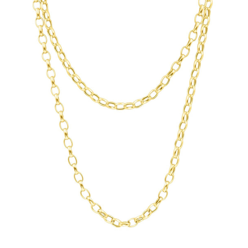 A double-strand gold chain necklace with alternating oval and elongated links, displayed against a solid white background. Palm Beach local Jewlery brand Pelimingo Palm Beach.