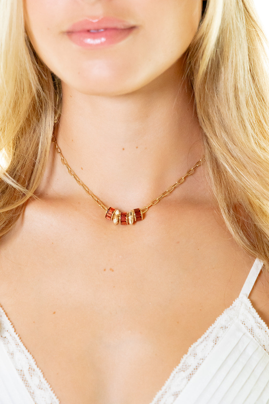 Orange Garnet Rondelles on our 16" Mizner Chain with spiked spacers