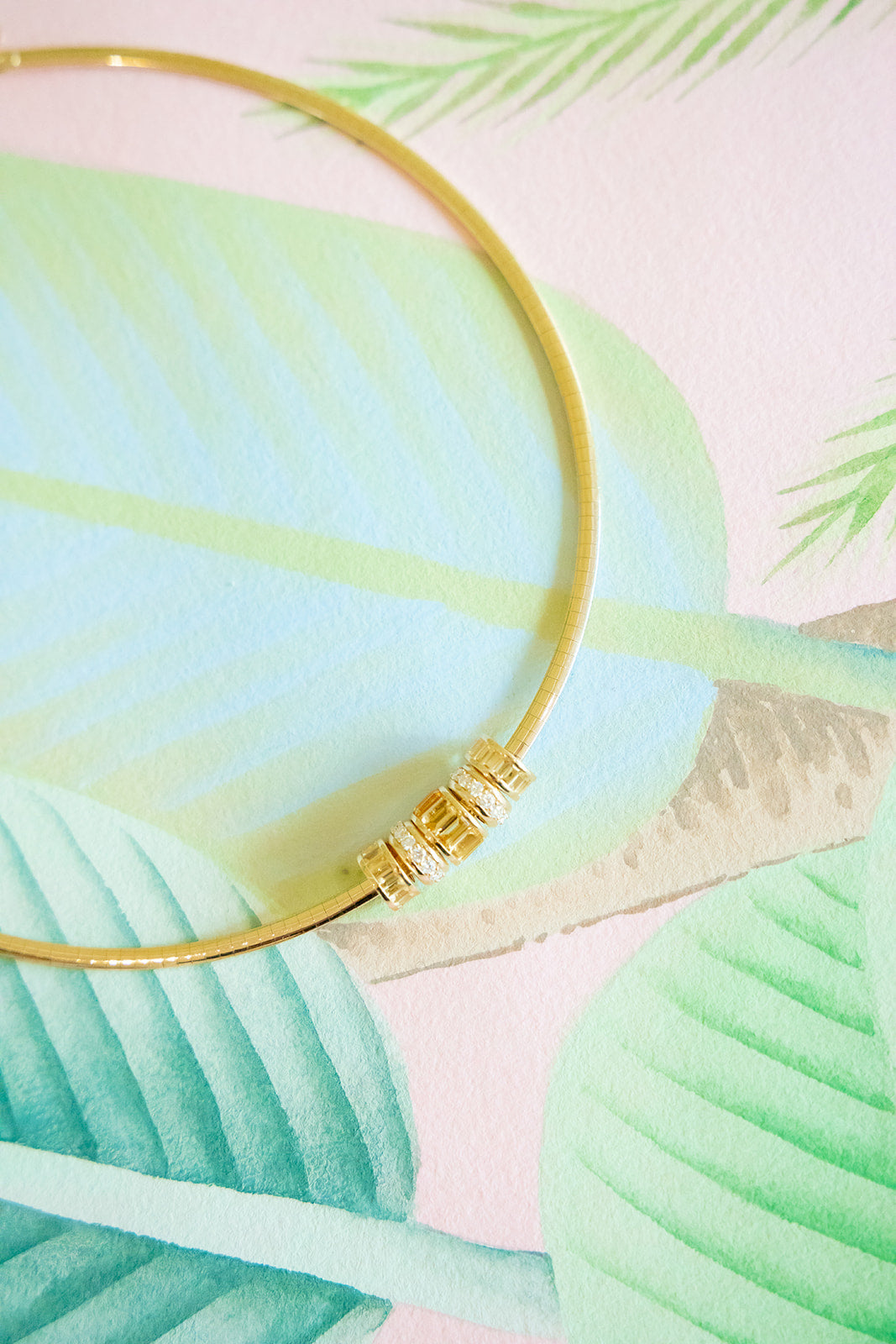 14k or 18K Omega collar called our Palm Beach Collar with the addition of rondelles and spacers