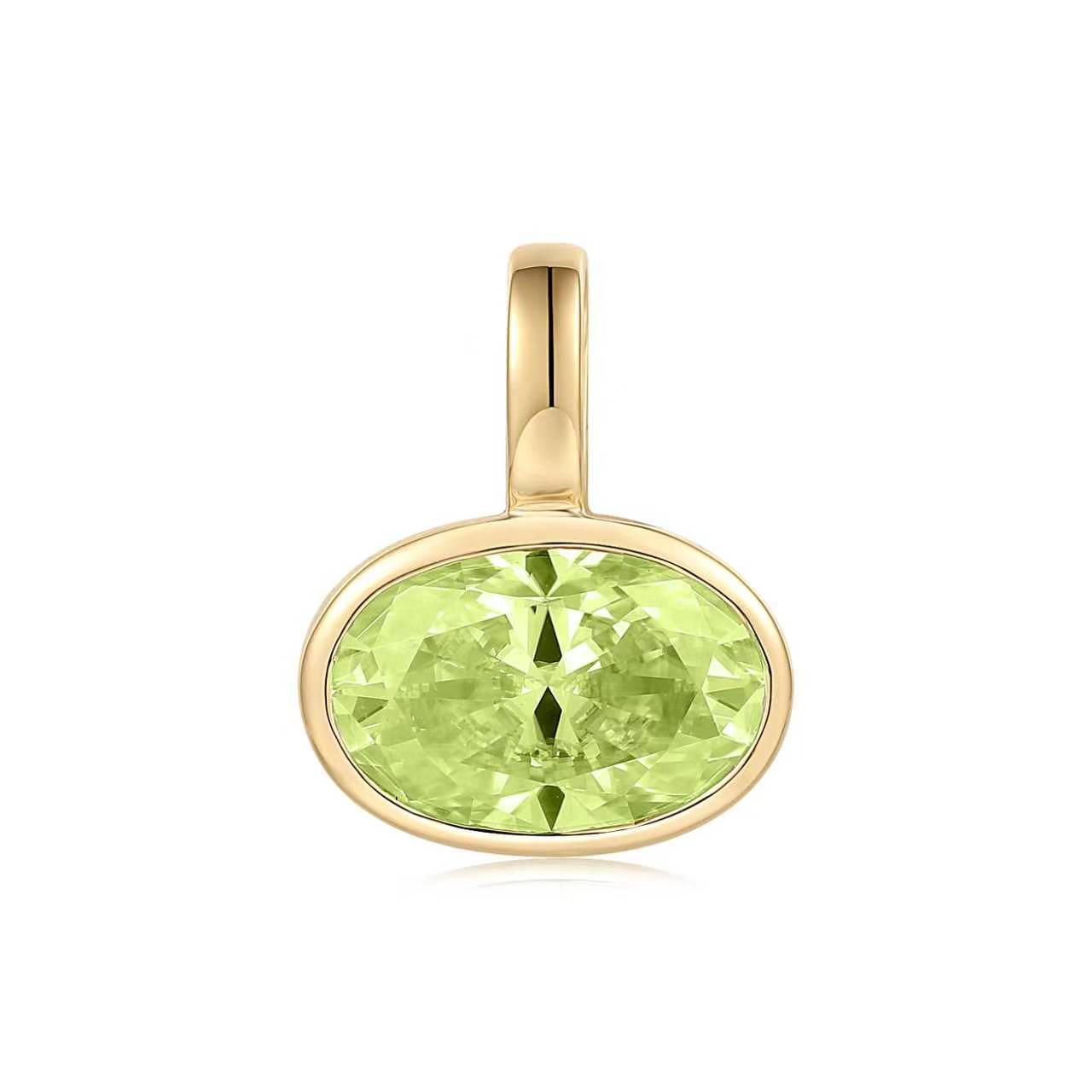 Gold pendant with a green gemstone on a white background, light green peridot set in 14K yellow gold.  Made by design team in Palm Beach, Florida Pelimingo Palm Beach.  Worn on necklace or collar