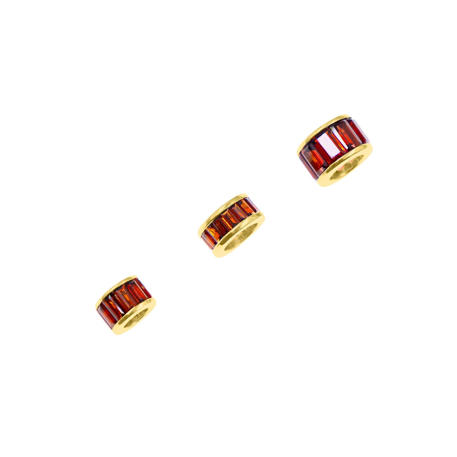 Red garnet rondelle set in 14K yellow gold.  Worn on necklace, bangles, chains and collars.  Palm Beach Designed Pelimingo Fine Jewlery.