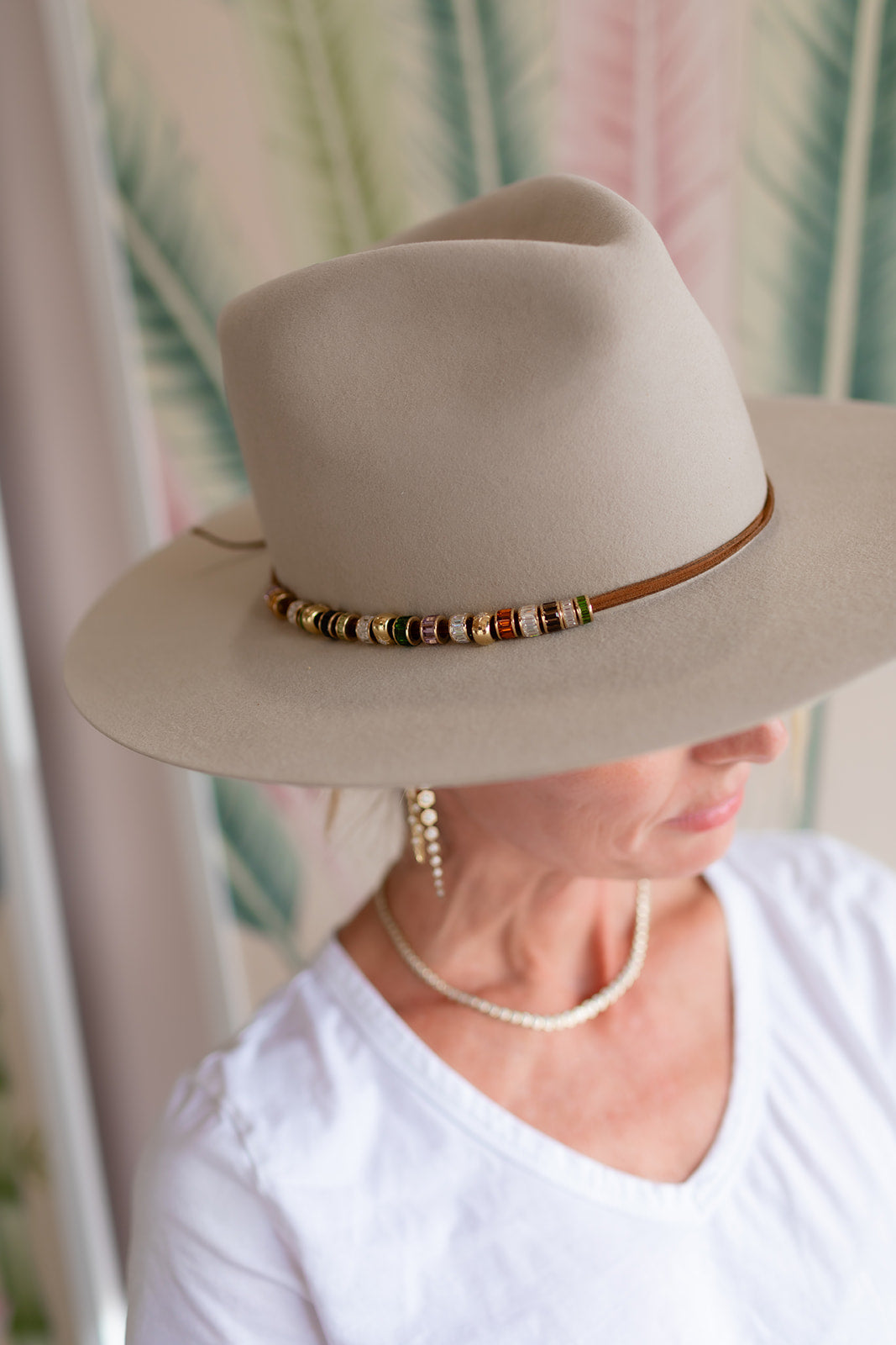 Cowboy hat covered in colored rondelles set in 14k yellow gold