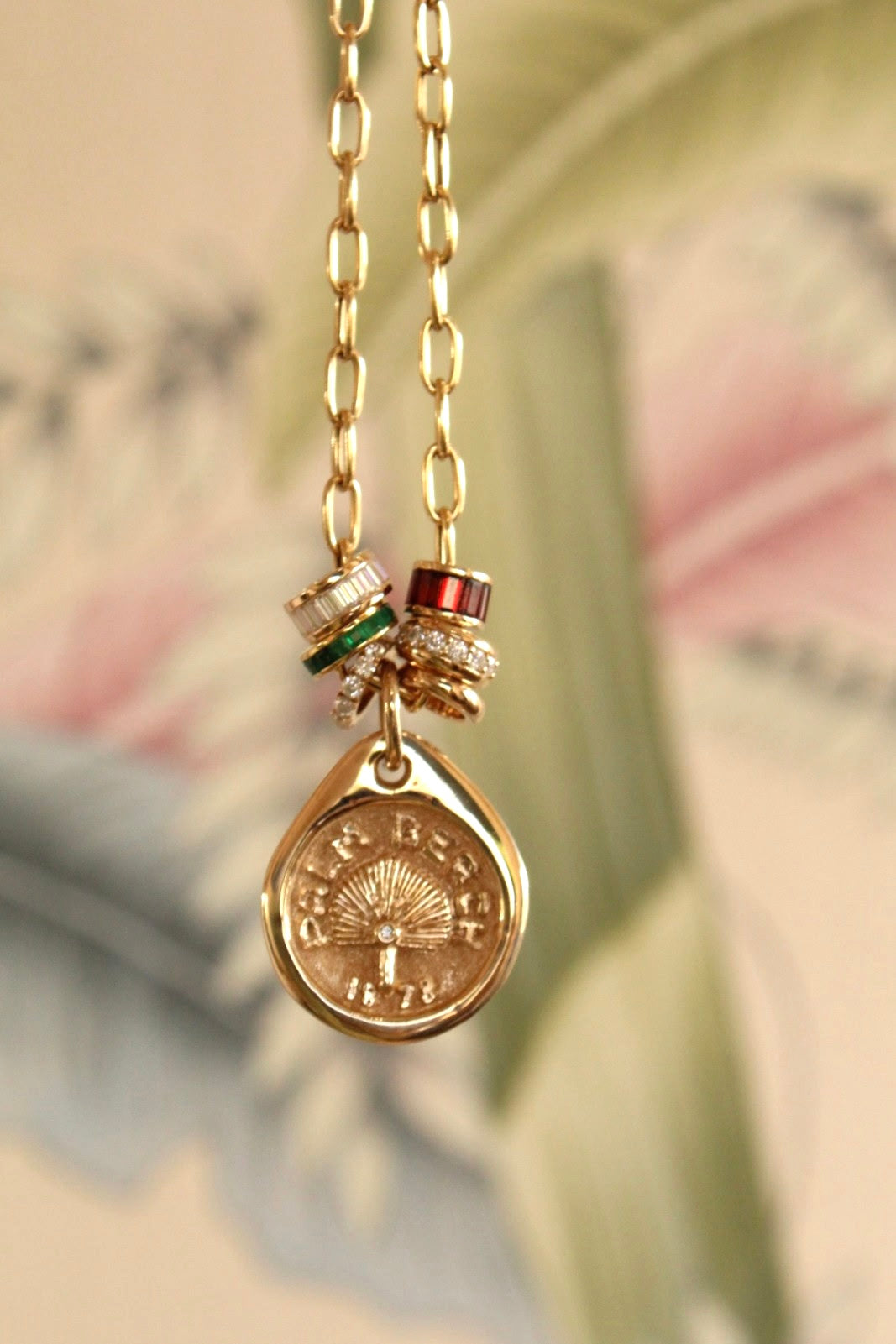 Our Palm Beach Pendant / Charm is made in 14K solid yellow gold with a satin and polished finish. Handcrafted in Palm Beach Florida by jewelry design team and local fine jewelry Pelimingo.  Palm Beach town name, date town was settled and native palm tree Sable Palm on charm.