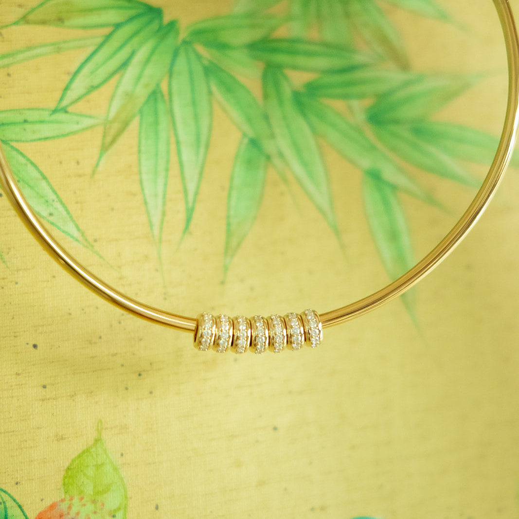 Triple Spacers in 14K yellow gold on our Gold Coast Tube Collar Italian Made in 18K 4mm with hinged opening